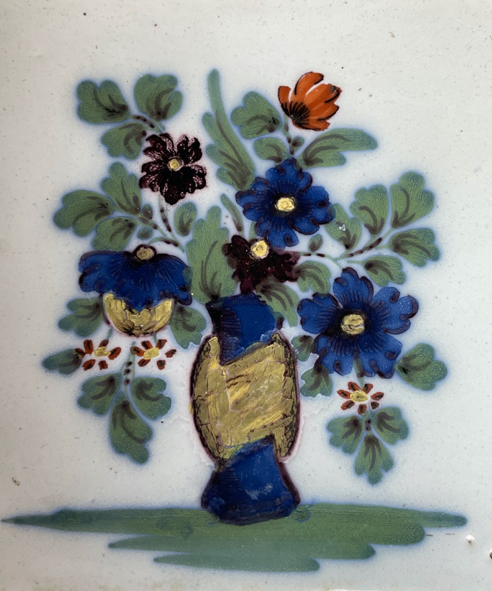 Bristol Delft polychrome tile with a vase of flowers  View II