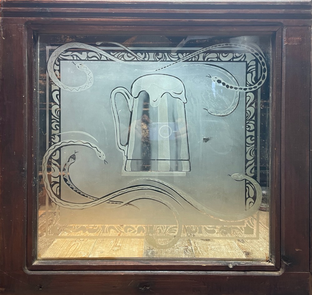 Pair of Victorian acid etched pub windows decorated with snakes View III