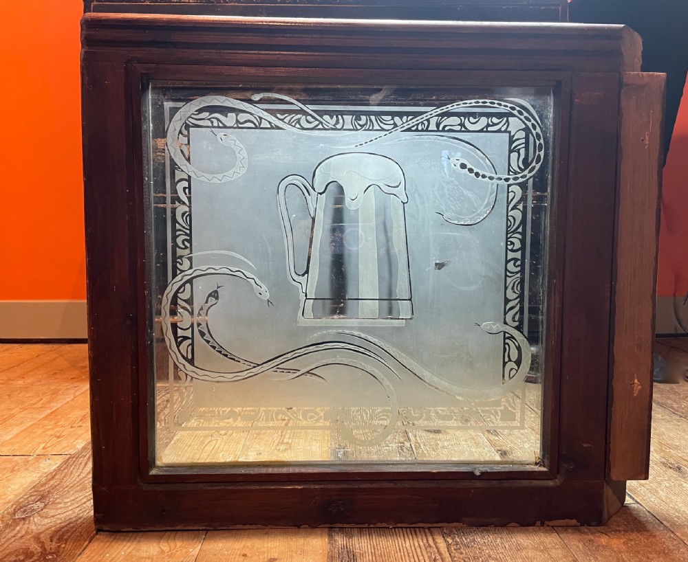 Pair of Victorian acid etched pub windows decorated with snakes View IV
