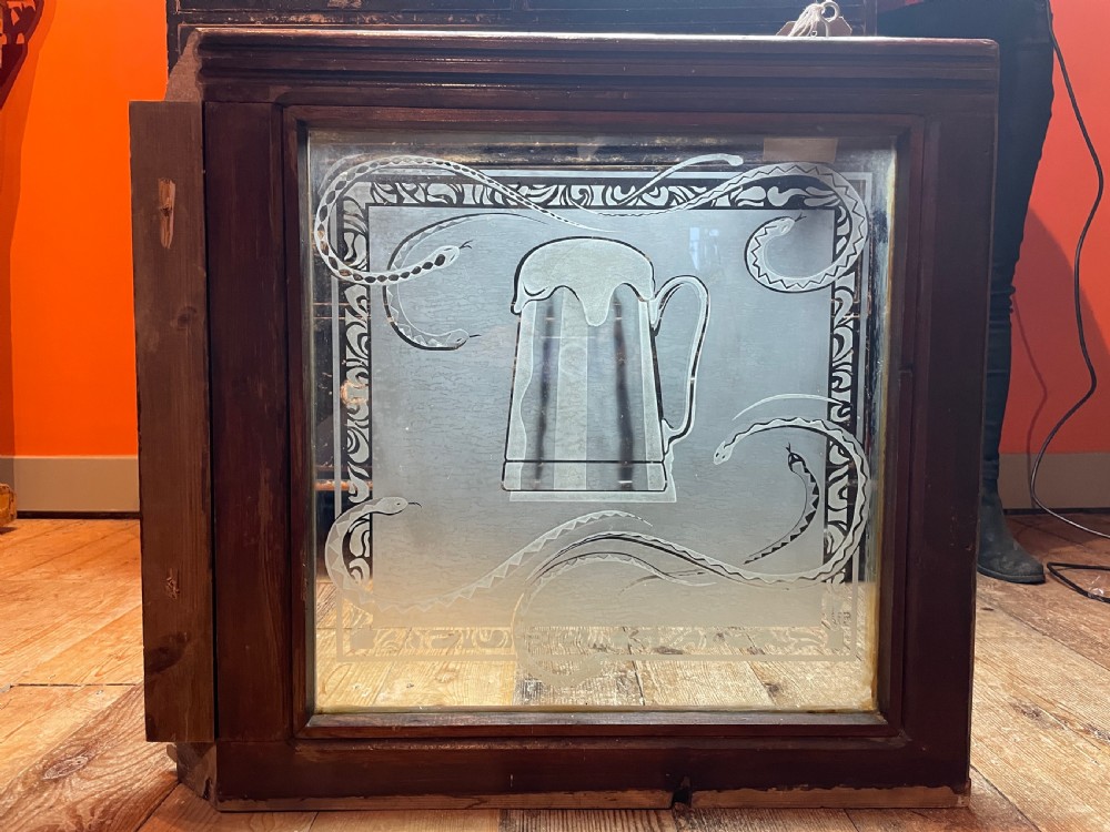 Pair of Victorian acid etched pub windows decorated with snakes View VI