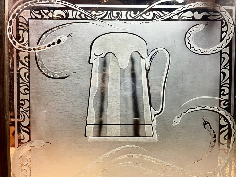 Pair of Victorian acid etched pub windows decorated with snakes View VII