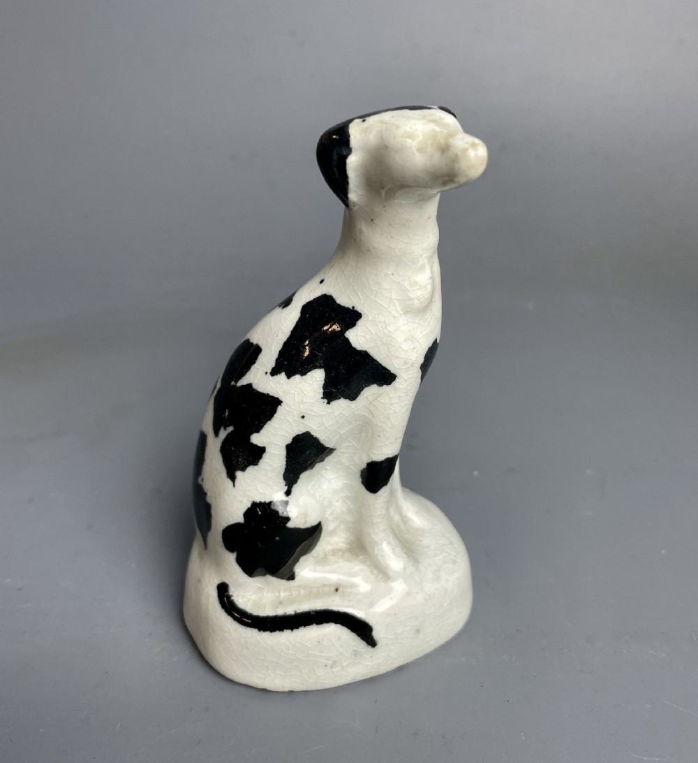 Victorian Miniature Staffordshire Model of a Seated Hound