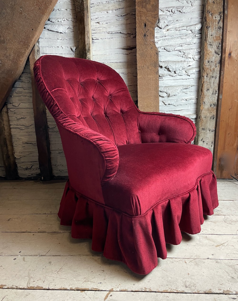 Victorian red velvet button back armchair