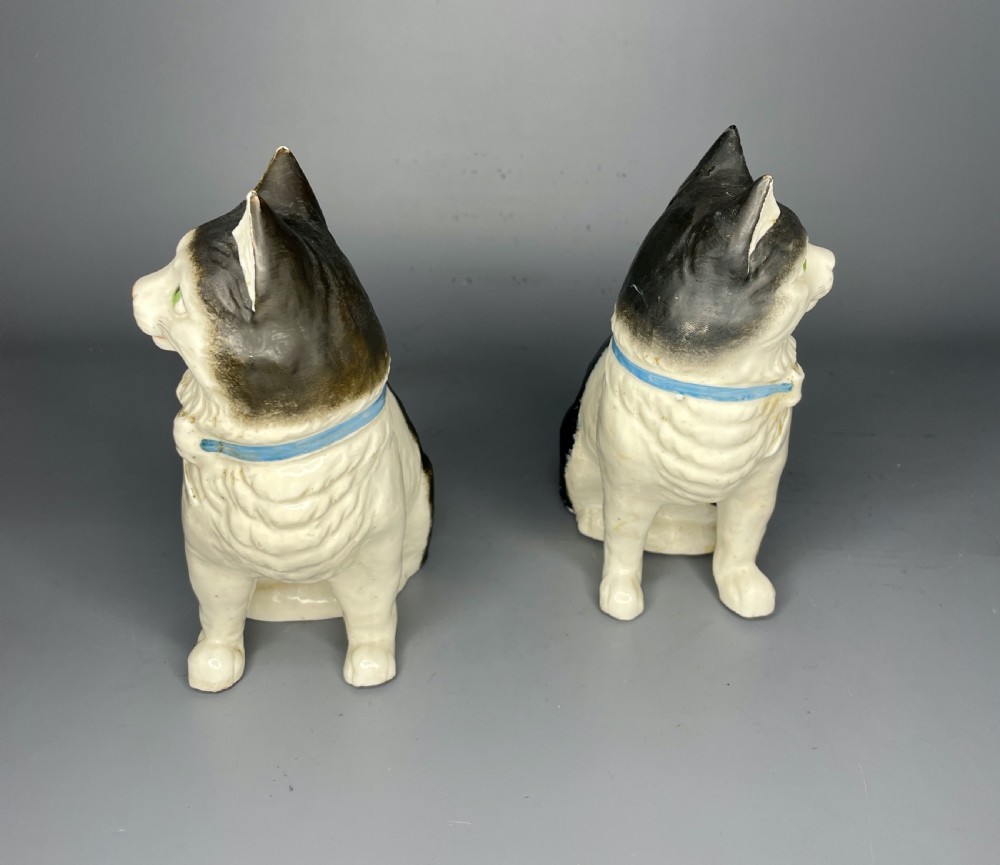 Pair of Continental pottery black & white seated cats View IV