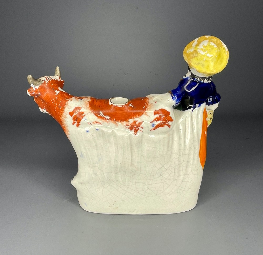 Victorian Staffordshire pottery milkmaid cow creamer View IV