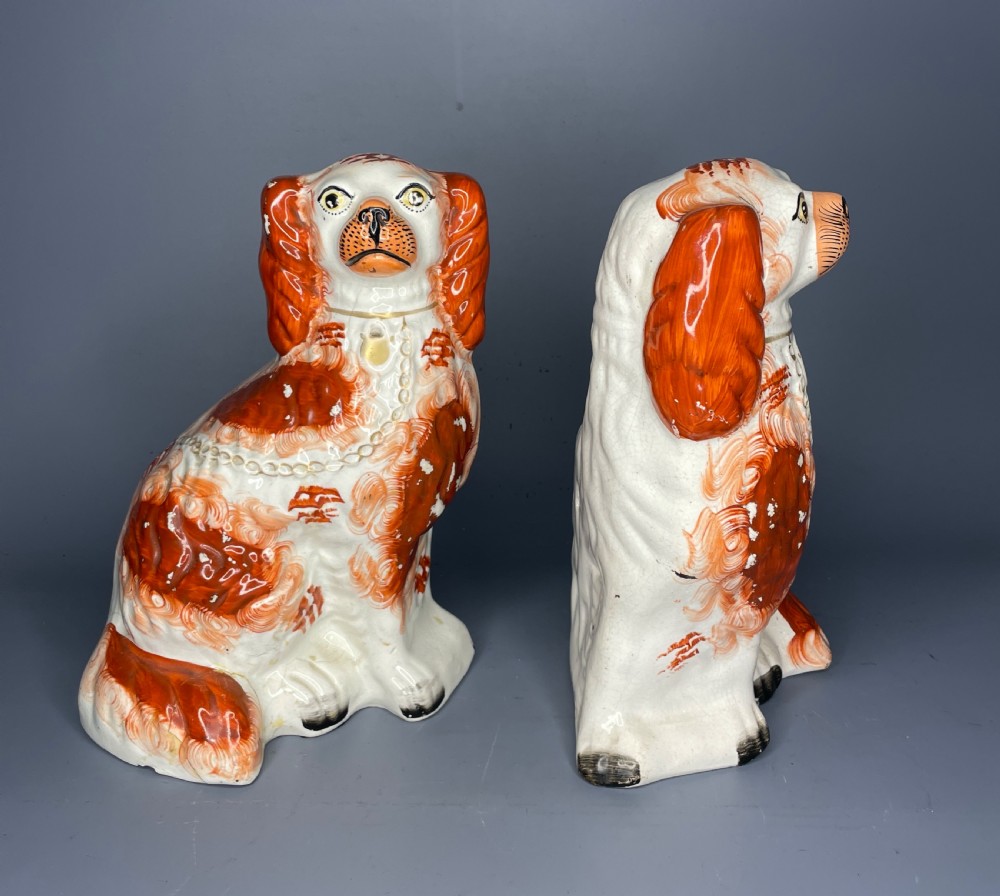 Pair of Staffordshire Pottery Spaniels with tan and white coats View III