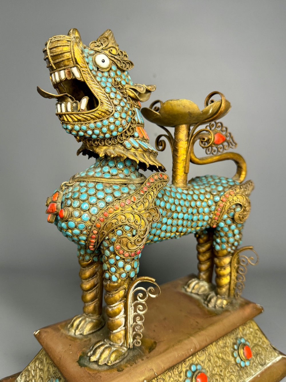 Tibetan Gilt-Metal Lion Vessel inset with turquoise and coral jeweling View II