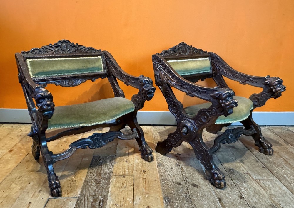 Unusual Pair of Continental Renaissance Style Carved Walnut Armchairs
