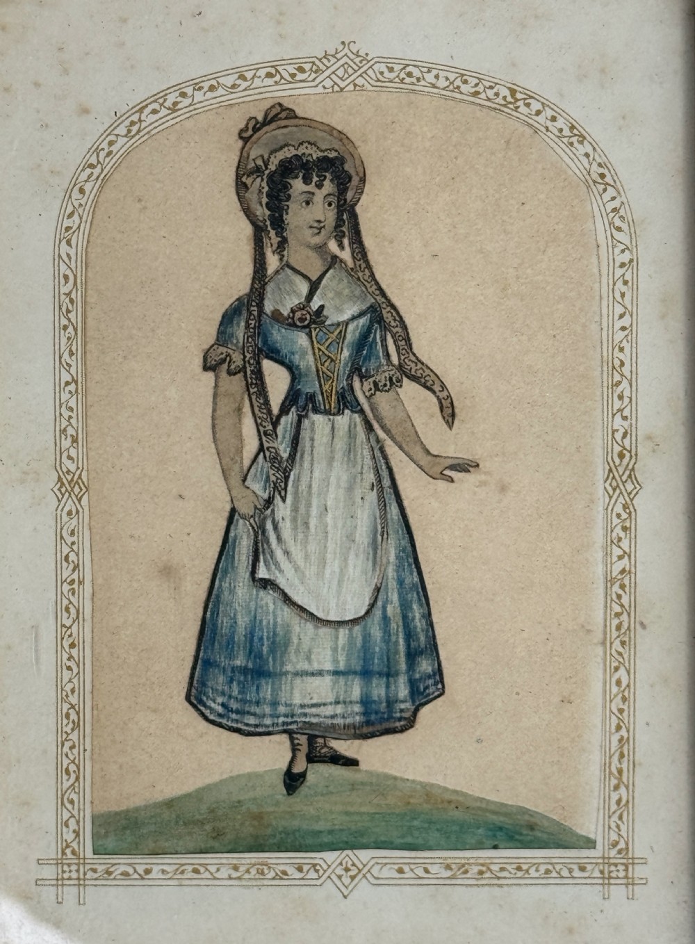 A pair of framed mid-nineteenth-century theatrical silkwork pictures depicting figures in period costume within moulded gilt wooden frames. View VI