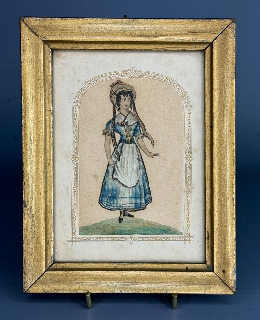 A pair of framed mid-nineteenth-century theatrical silkwork pictures depicting figures in period costume within moulded gilt wooden frames. View VII