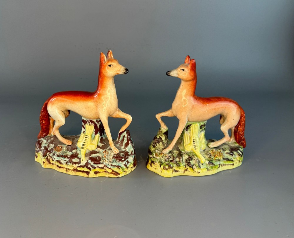 Pair of Victorian Staffordshire Foxes with Birds