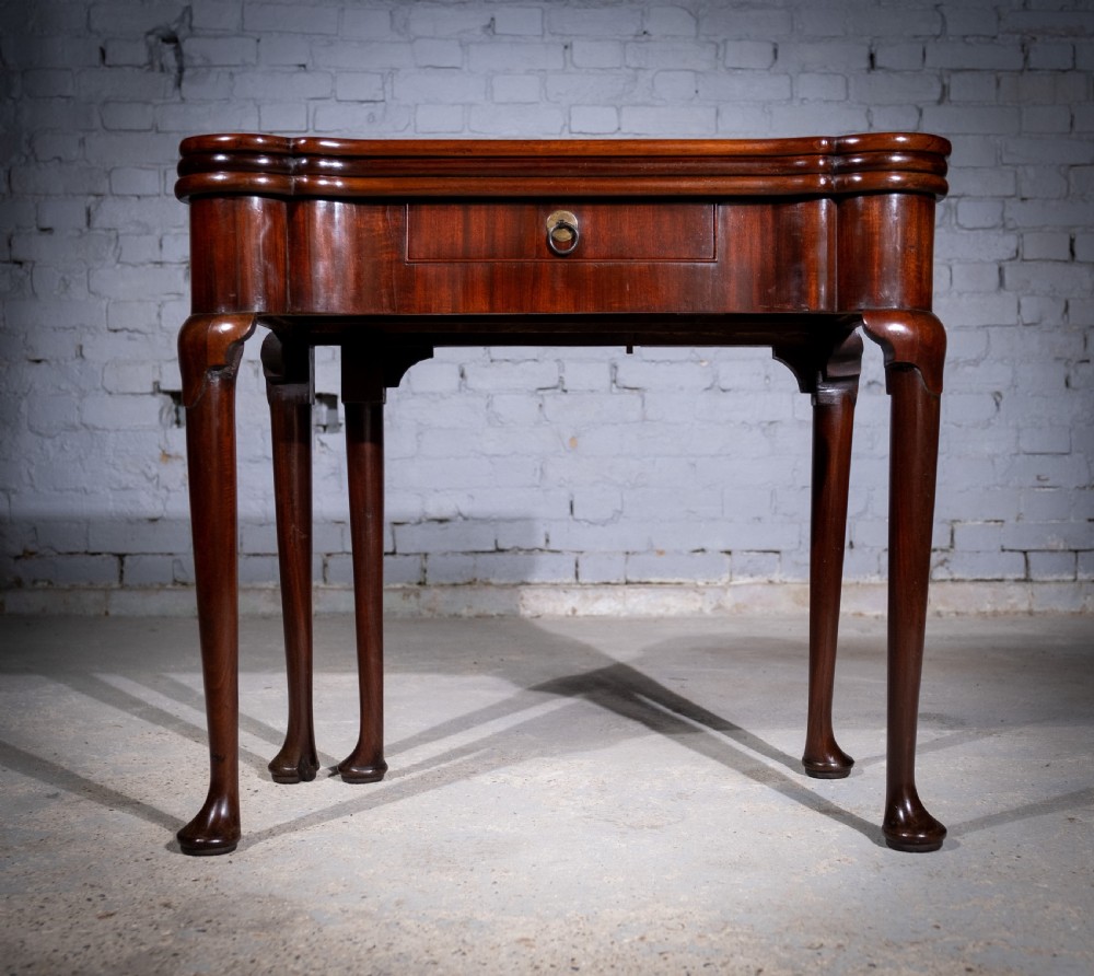 George II Mahogany Triple Top Games & Tea Table, c.1750.