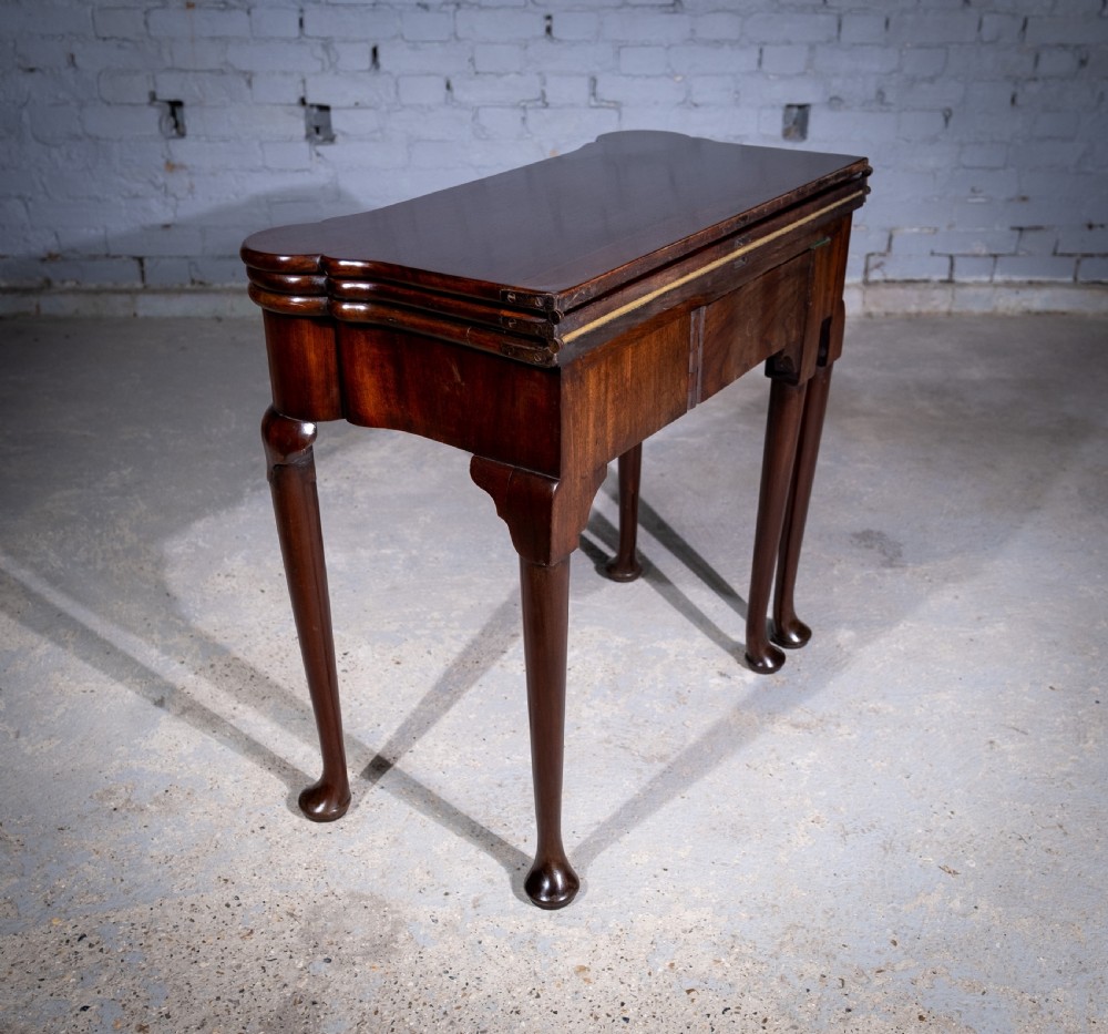 George II Mahogany Triple Top Games & Tea Table, c.1750. View X