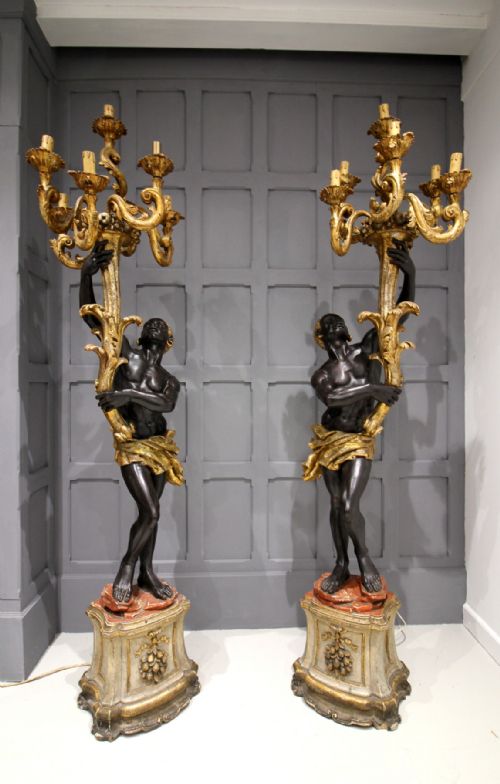 A Beautiful Pair of Italian Blackamoor Candelabra Stands