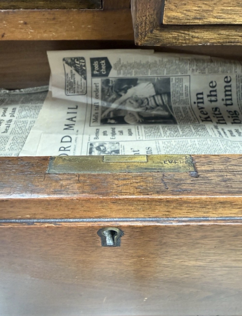 A tall Victorian mahogany chest of drawers featuring two short drawers above four long drawers with brass drop handles and a plinth base. View VII