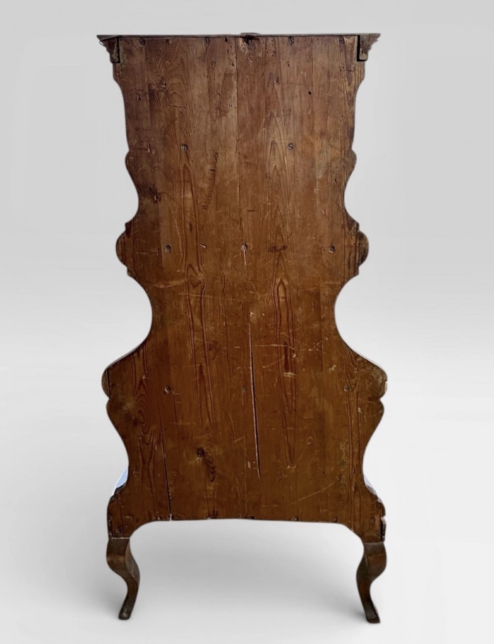 A nineteenth-century walnut etagere featuring open serpentine shelves, patterned wood veneers, ornate gilt metal mounts, and cabriole legs. View VI