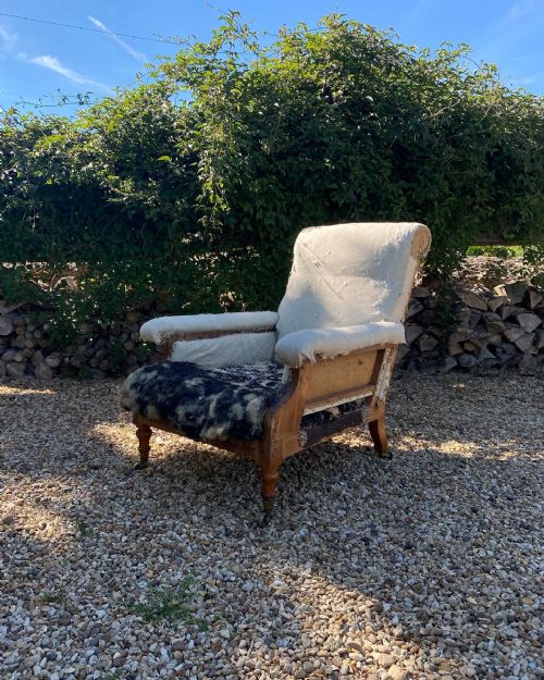 a howard and sons willoughby flat armchair - CATEGORY: ANTIQUE CHAIRS - DATED 19TH CENTURY