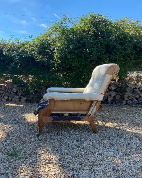A HOWARD AND SONS WILLOUGHBY FLAT ARMCHAIR - ADDITIONAL PHOTO 1