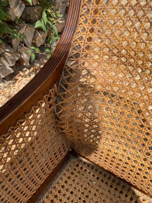 A REGENCY BERGERE ARMCHAIR - ADDITIONAL PHOTO 4