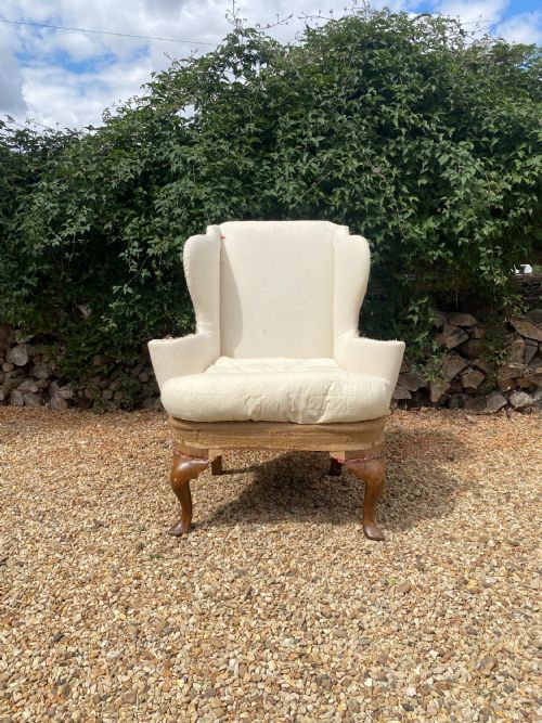 A 20TH CENTURY CONTINENTAL WINGCHAIR - ADDITIONAL PHOTO 1