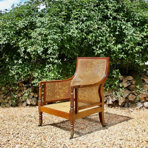 a regency bergere armchair - CATEGORY: ANTIQUE CHAIRS - DATED REGENCY