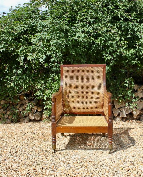 A REGENCY BERGERE ARMCHAIR - ADDITIONAL PHOTO 1