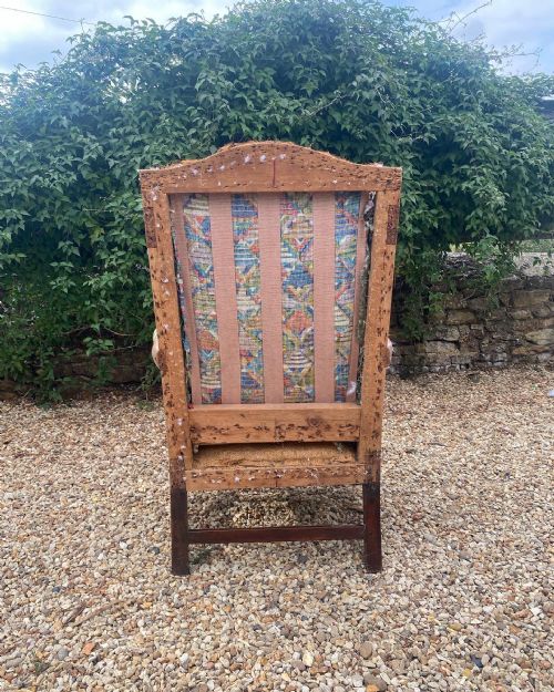 A 18TH CENTURY COUNTRY HOUSE WINGCHAIR - ADDITIONAL PHOTO 3