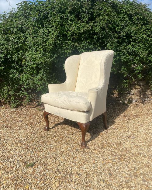 a continental wingchair - CATEGORY: ANTIQUE CHAIRS - DATED 19TH CENTURY