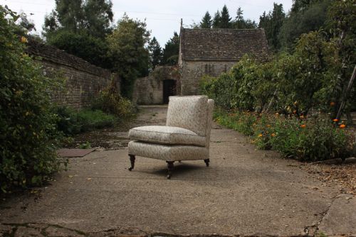 A Howard and Sons Slipper Chair Upholstered in Robert Kime Anura Fabric