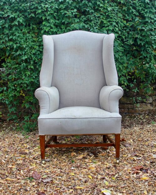 A 19TH CENTURY WINGCHAIR - ADDITIONAL PHOTO 1