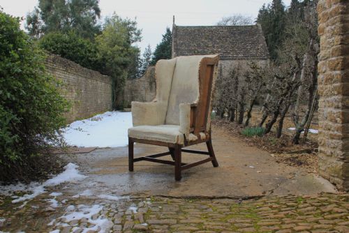 a 18th century wingchair - CATEGORY: ANTIQUE CHAIRS - DATED 1750