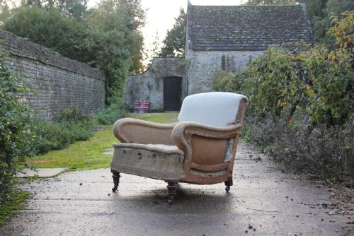 a 19th century scrolledarm chair - CATEGORY: ANTIQUE CHAIRS - DATED 19TH CENTURY
