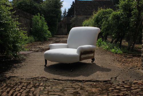 a deep seated club chair - CATEGORY: ANTIQUE CHAIRS - DATED VICTORIAN