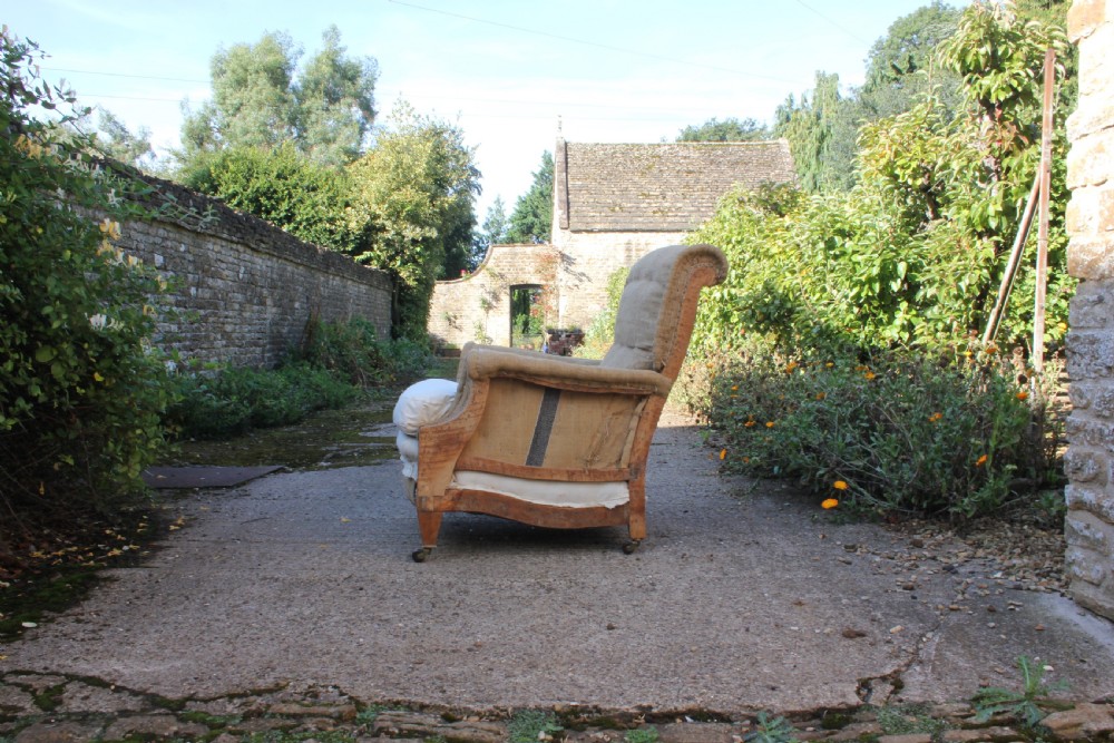 A Edwardian Howard style armchair  View II