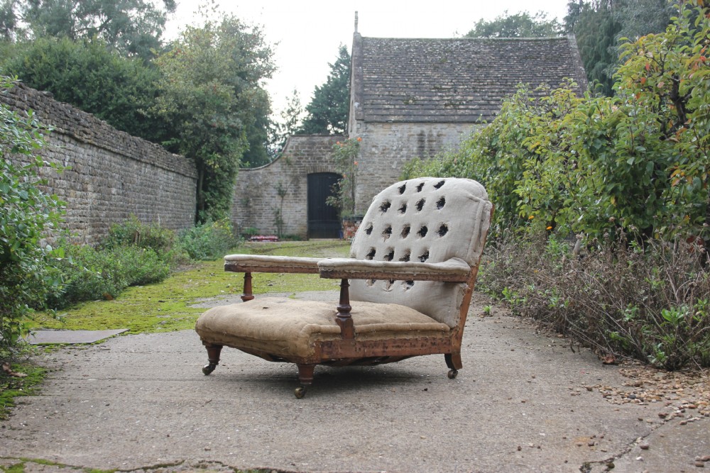 A deep open armchair Robertsons & Colman 