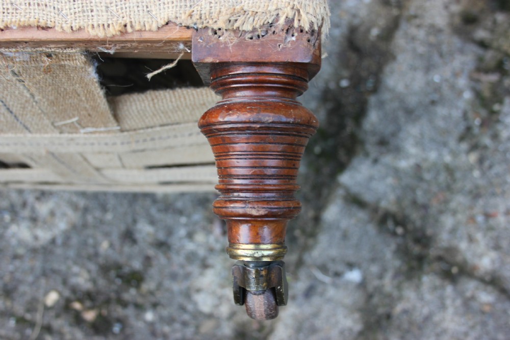 A 19th century scrolled-arm chair View V