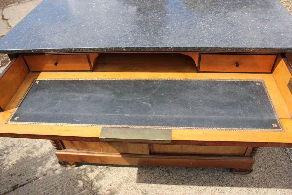 A 19th-century French walnut secretaire featuring a dark marble top, a top drawer, double cupboard doors flanked by spiral twist columns, and scroll feet. View V