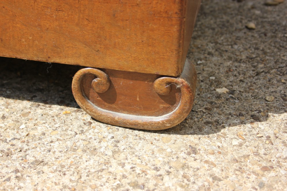 A 19th-century French walnut secretaire featuring a dark marble top, a top drawer, double cupboard doors flanked by spiral twist columns, and scroll feet. View VI