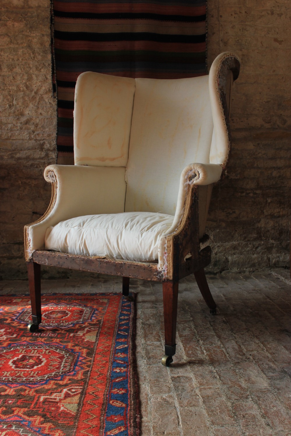 a Georgian barrel back wingchair