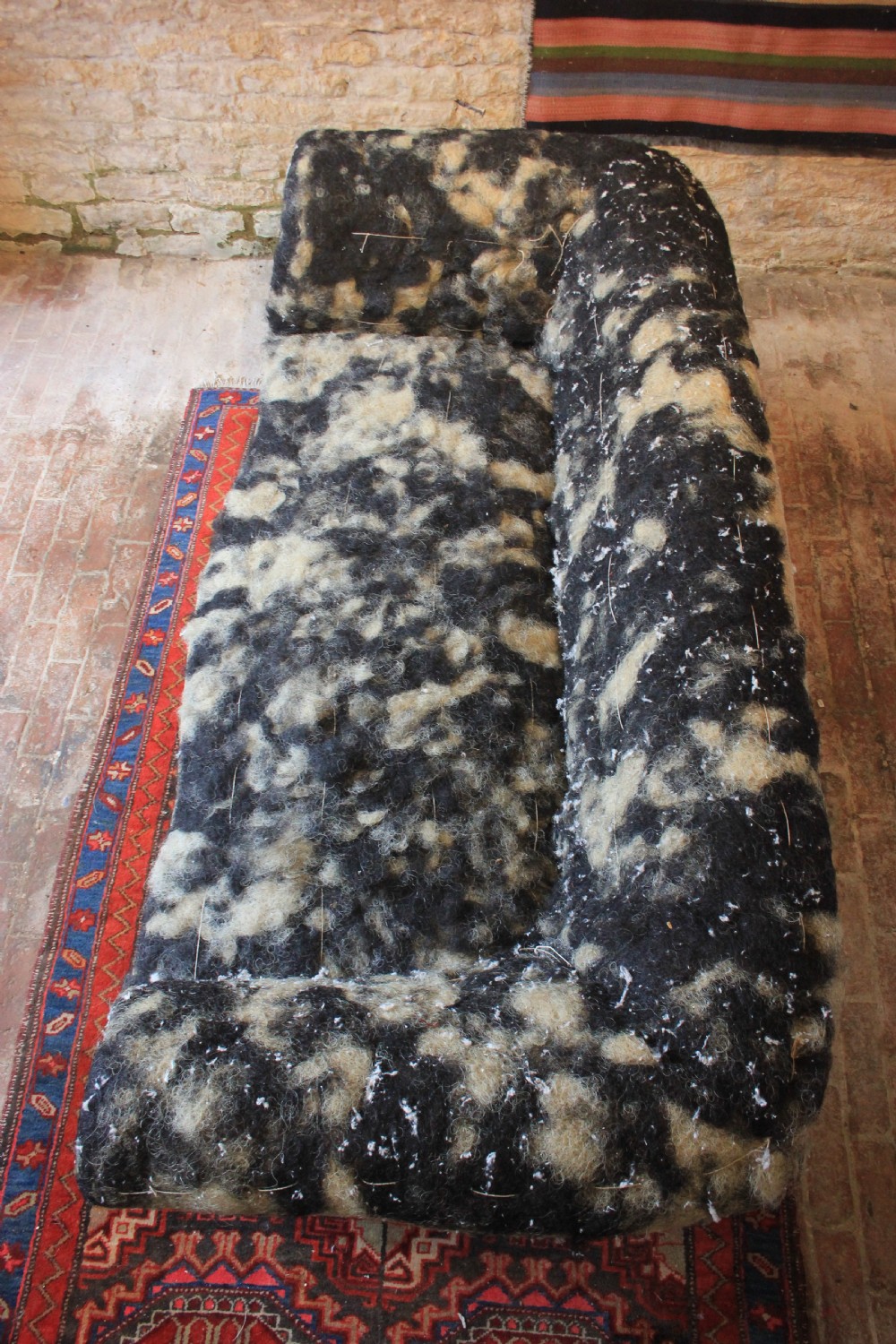 A Howard and sons serpentine front sofa  View III