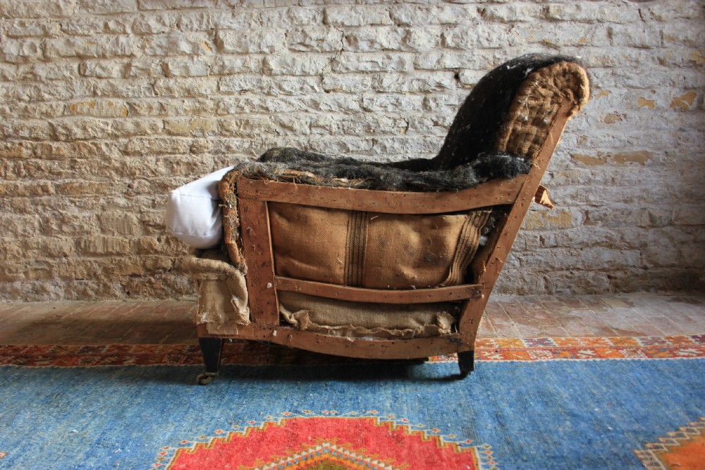 A large, deep seated Howard style armchair View II