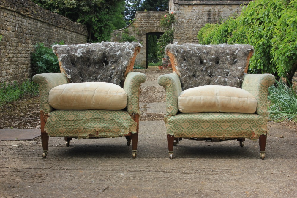 A pair of Howard & sons woodstock armchaira View V