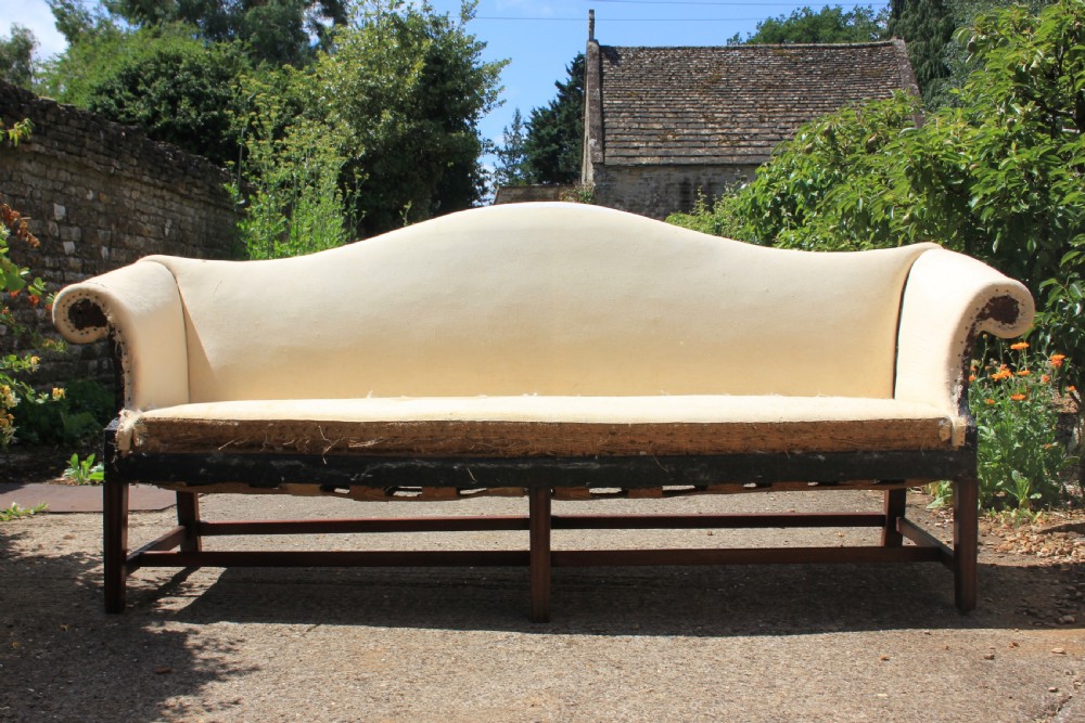 An 18th century, serpentine front camel back sofa View II