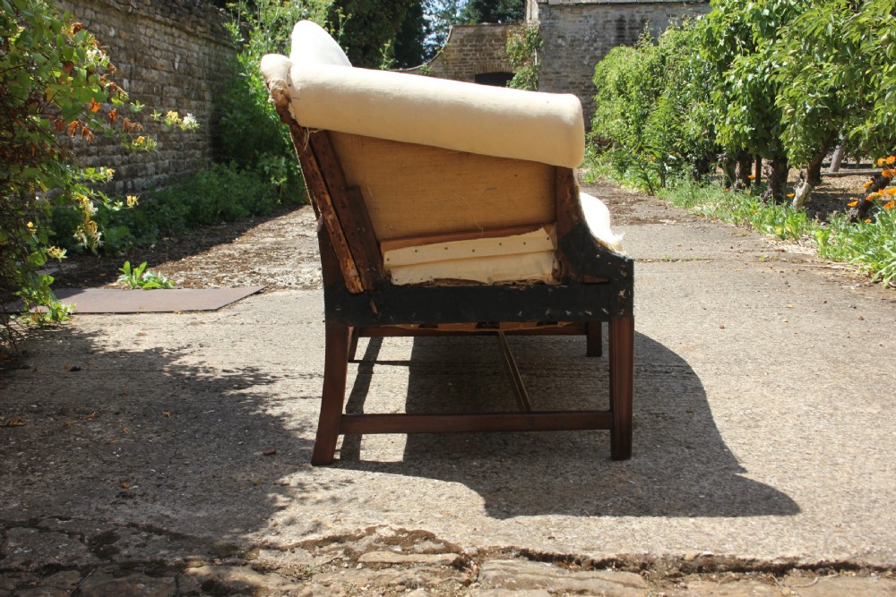 An 18th century, serpentine front camel back sofa View III