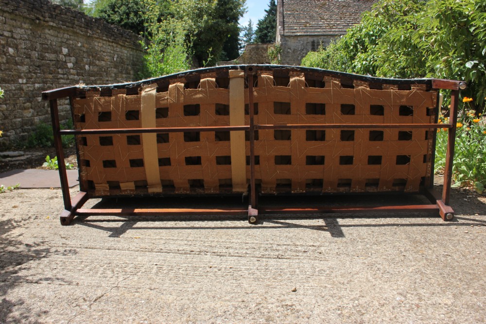 An 18th century, serpentine front camel back sofa View V