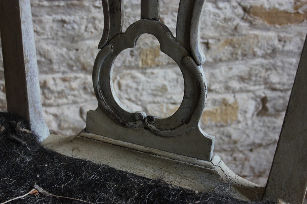 A pair of 18th century painted hall chairs View III