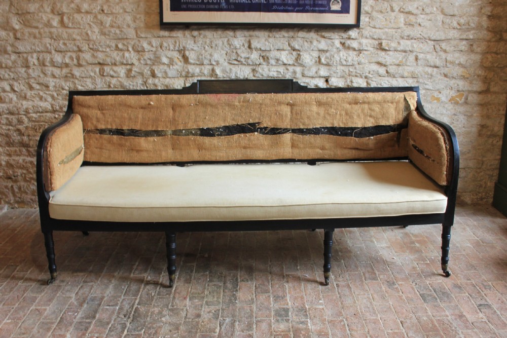 An Ebonised regency period Sofa View II