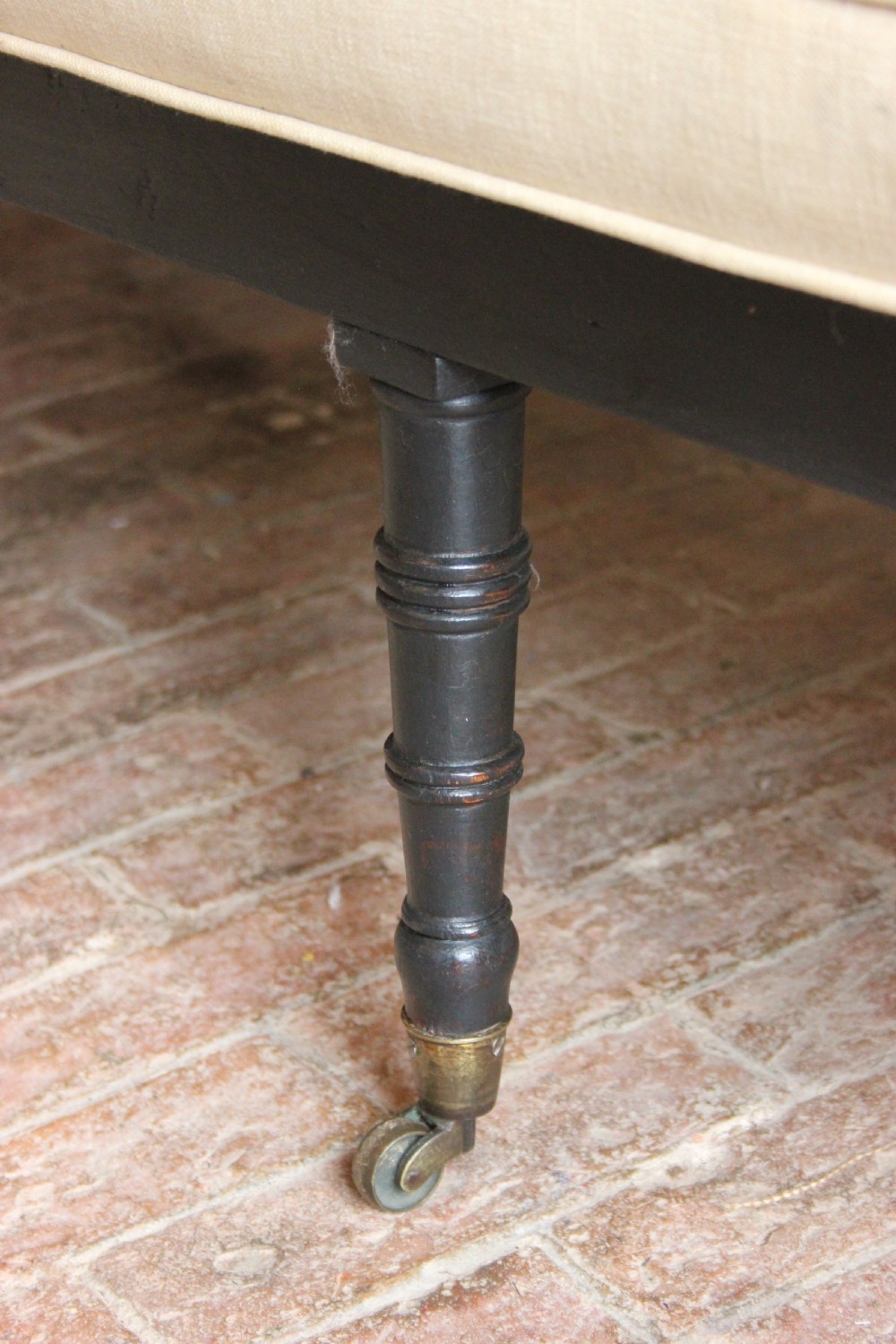 An Ebonised regency period Sofa View III