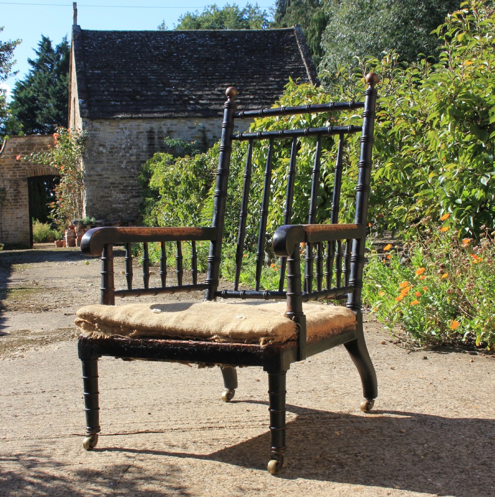 A 19th century Ebonised armchair  View III