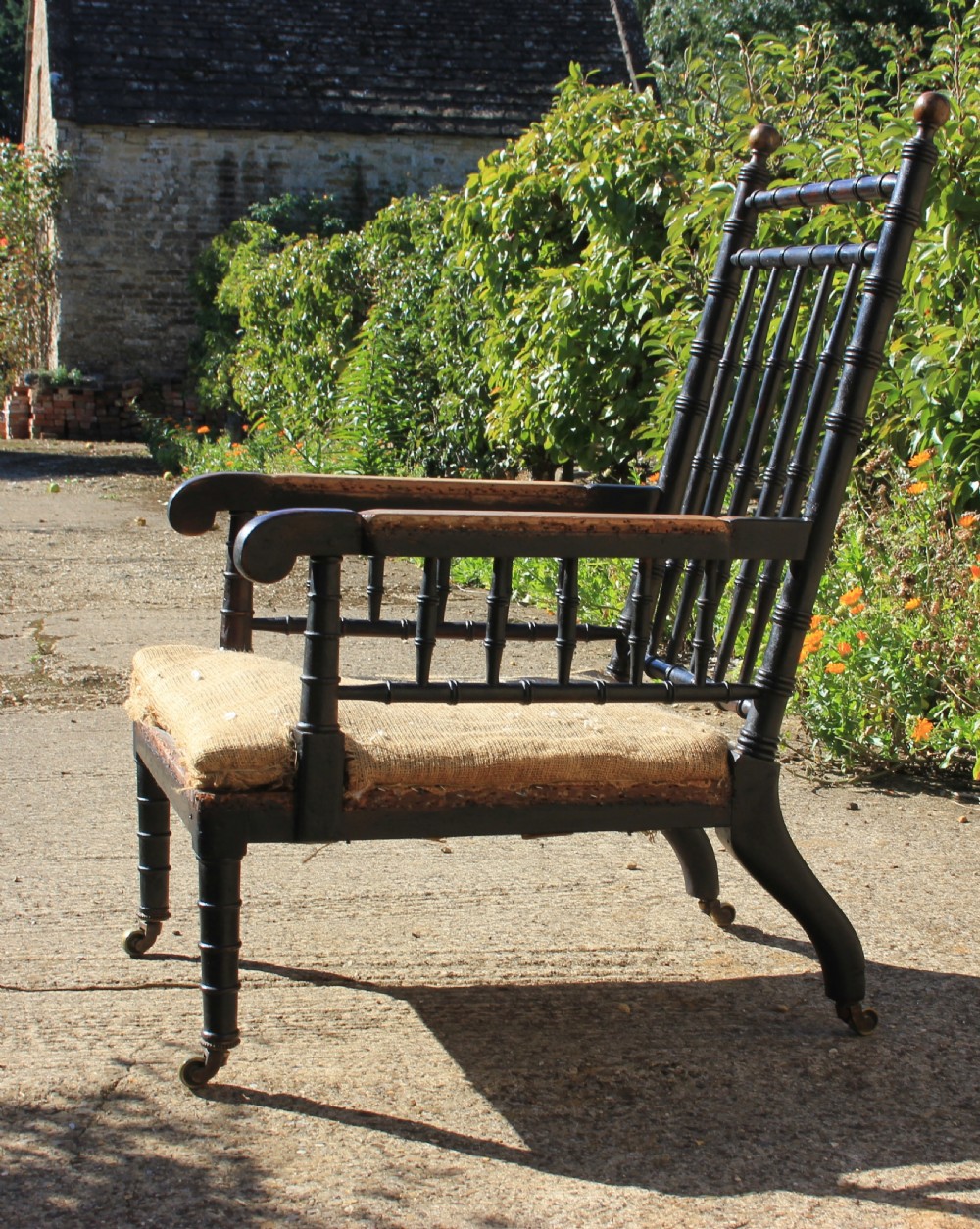 A 19th century Ebonised armchair  View XI